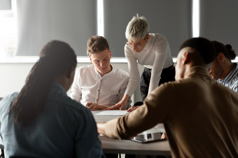 Marketo consultants collaborating with a SaaS team to improve lead management.