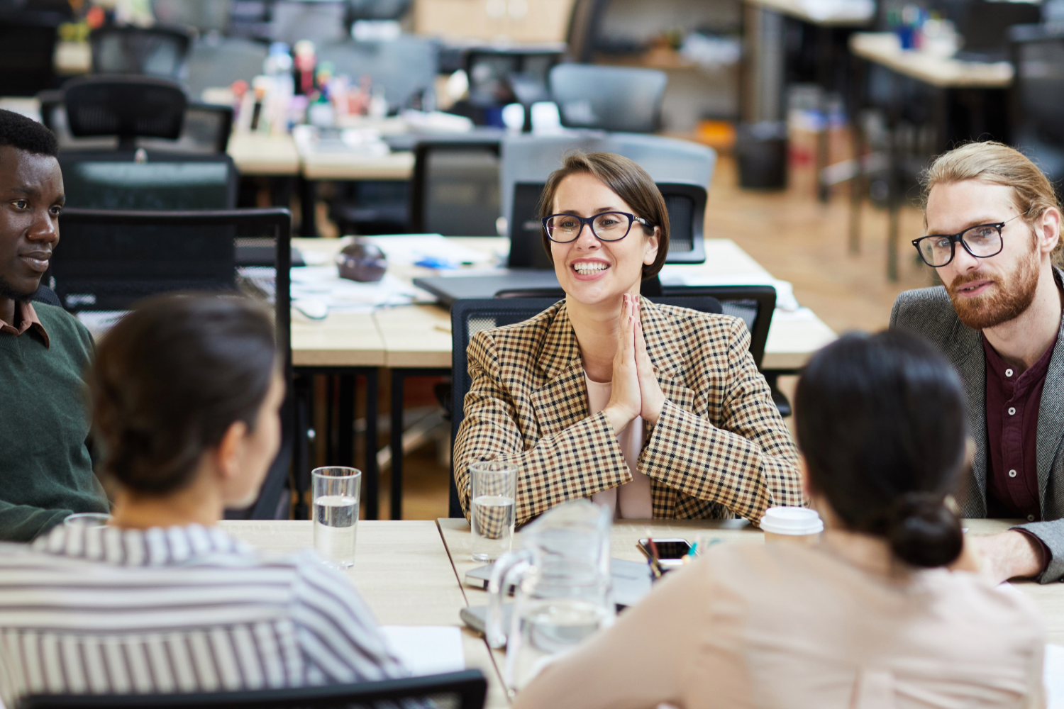 Marketo agency partners collaborating on campaign automation for a growing business.