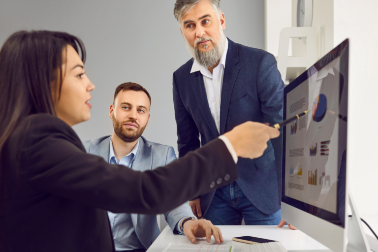 Marketing team planning a Marketo Email campaign strategy