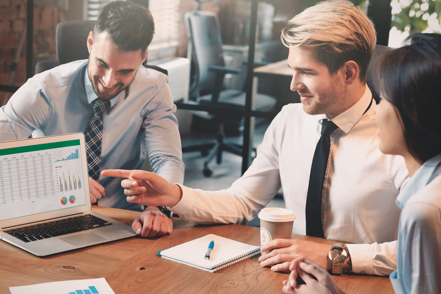 Email campaign planning session with marketers improving execution using Marketo consulting services